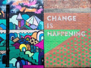 Graffiti that reads "Change is happening".